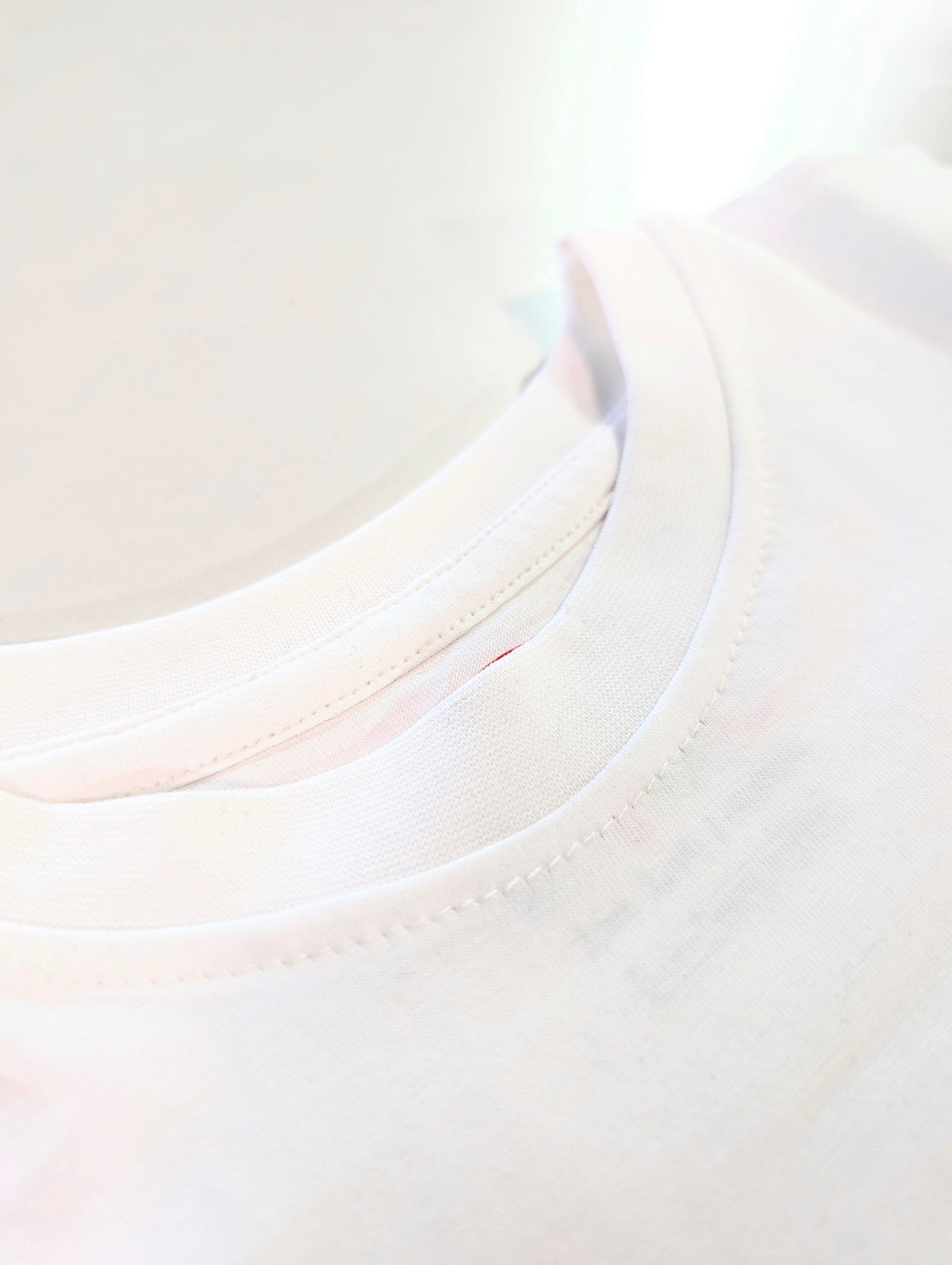 Close-up of PYOC neck stitching